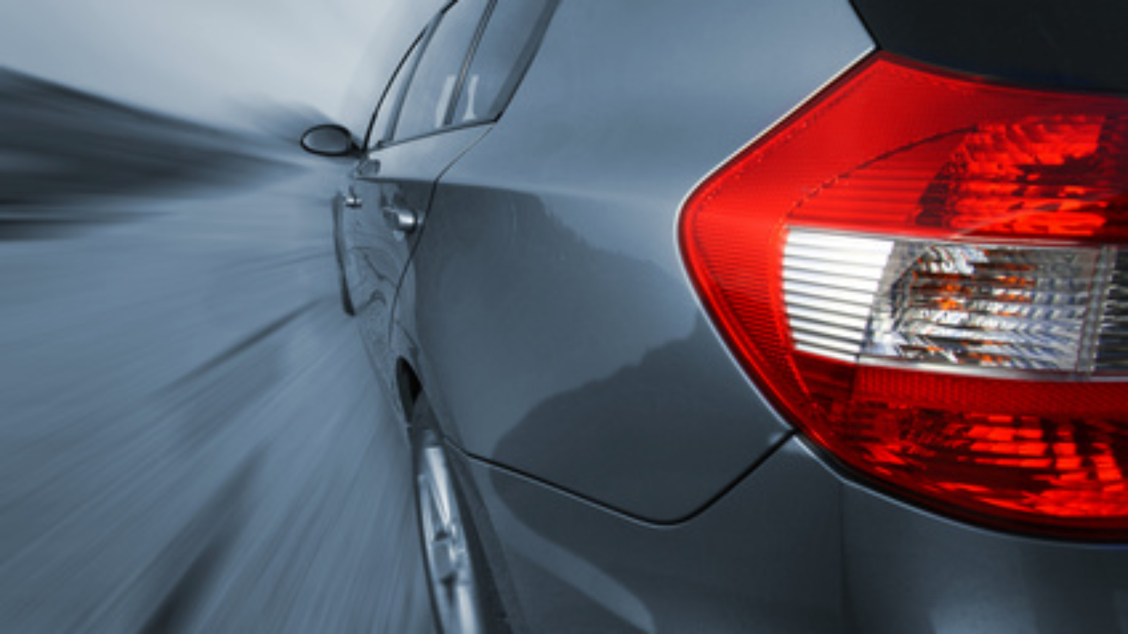 Front view of a sports car, shot with a wide angle lense. No logo shown.