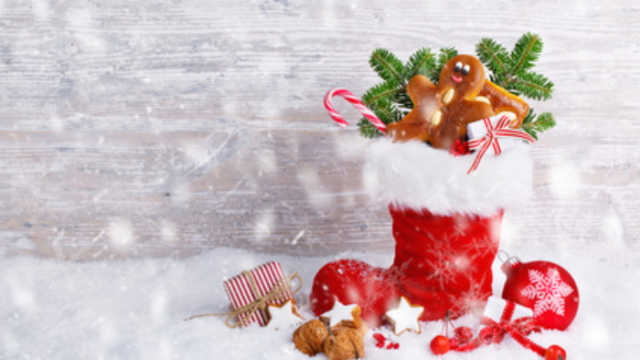 Nikolaus, Weihnachten  -  Hintergrund mit Nikolausstiefel und Sigkeiten